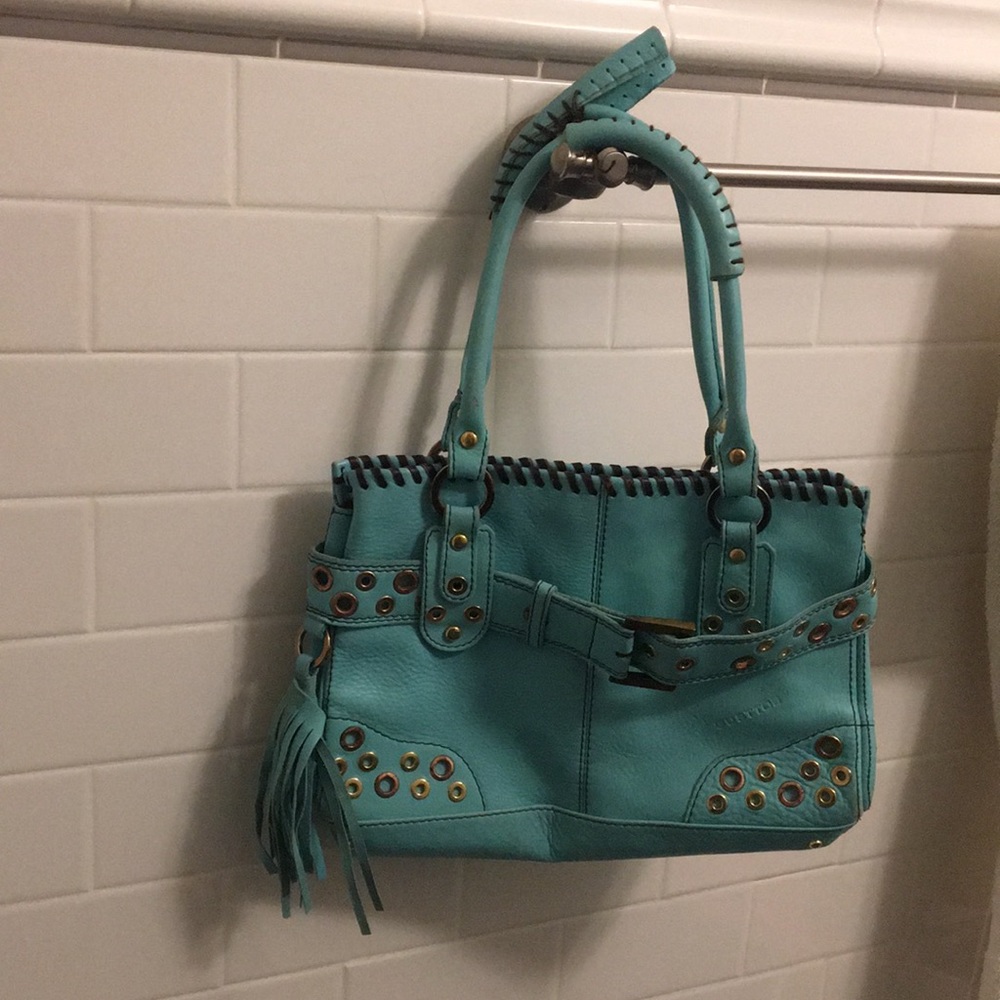 Turquoise purse with gold details